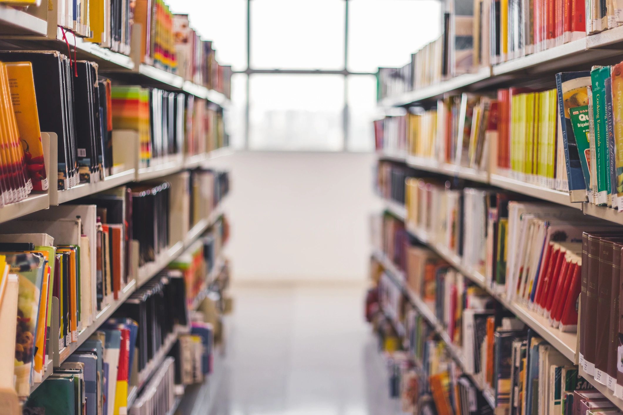 Colorful library shelves full of books